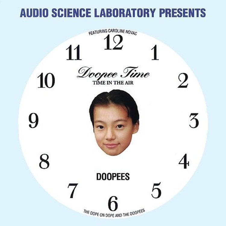 cover of Doopee Time album, showing a clock face with the face of a smiling young girl in the center. Text reads "Audio Science Laboratory Presents: Doopee Time: Time in the Air, featuring Caroline Novac'